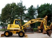 Komatsu  PW110- колесный экскаватор