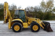 Komatsu WB97S — экскаватор-погрузчик